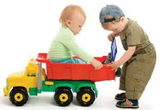 Boys Playing with Trucks