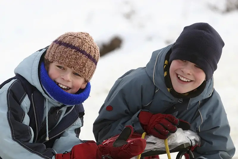 boys sledding