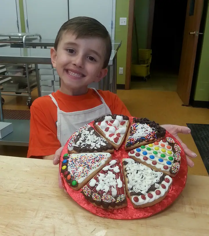 boy with cookie pizza