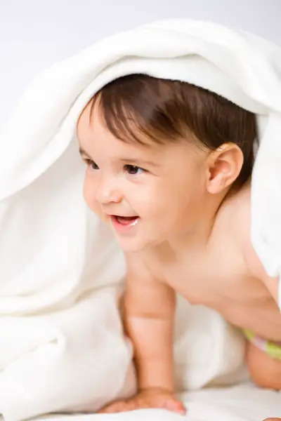 Child Crawling in Blanket