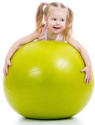 child on stability exercise ball