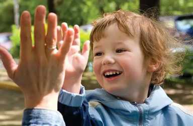 child-high-five