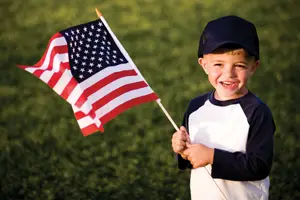 Veterans' Day; child holding American flag