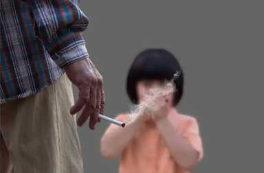child-holding-breath-with-smoker