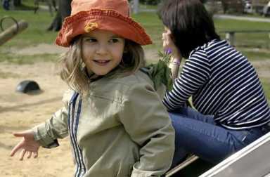 child-on-playground-with-nanny-main