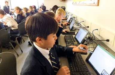 children-in-classroom-on-computers
