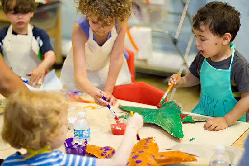 children painting arts and crafts