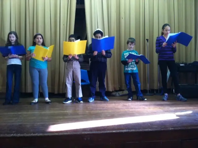 children singing in temple