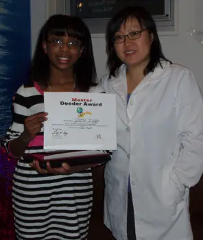 Dr. Lily Eng, dentist; Deja Irby, good deed contest winner