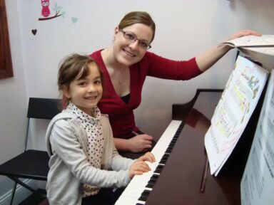 east-west-child-teacher-piano