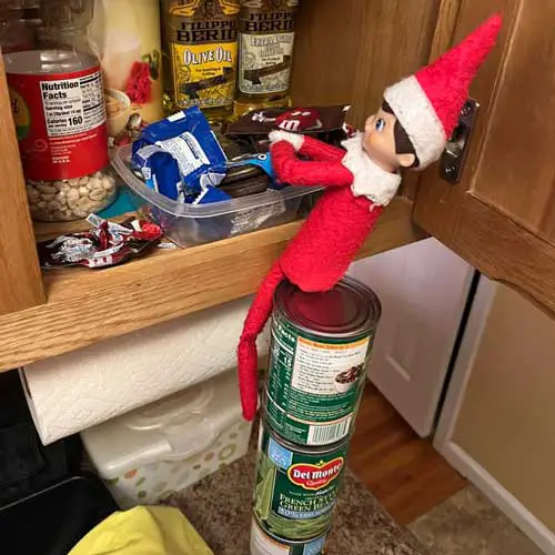 elf on the shelf raiding candy stash