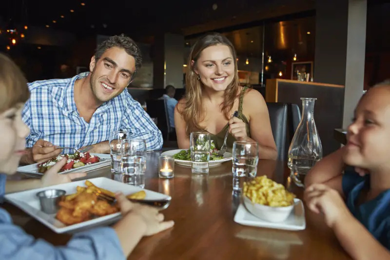 family dining at restaurant