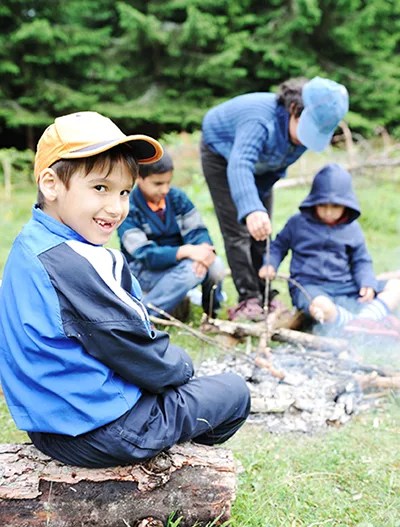 family camping with fire