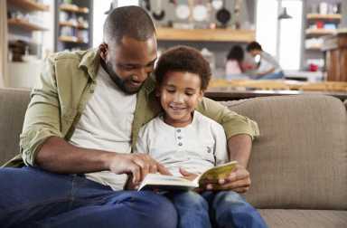 father-reading-to-son