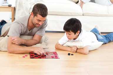 father-son-playing-checkers