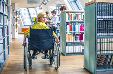 girl-in-wheelchair-in-library