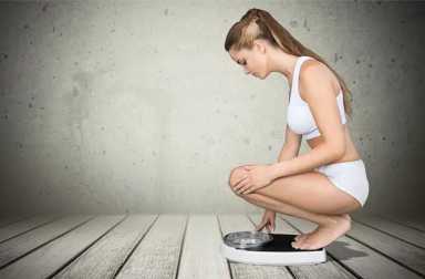 girl-looking-at-scale