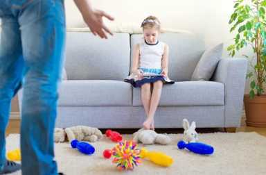 girl-refusing-to-clean-toys