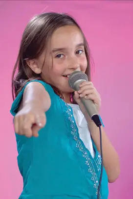girl singing with microphone