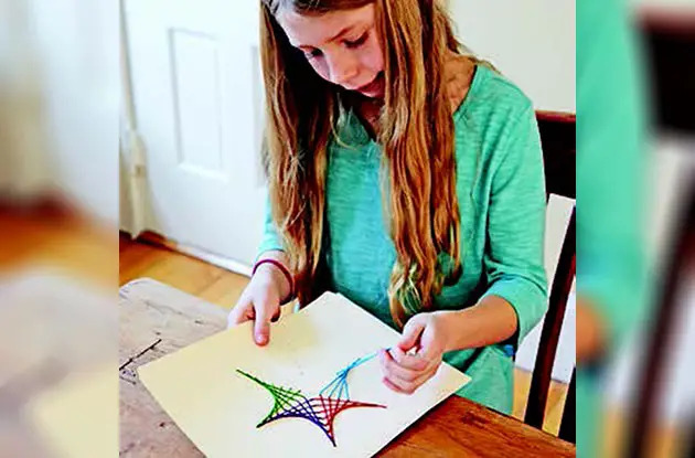 girl stitching star