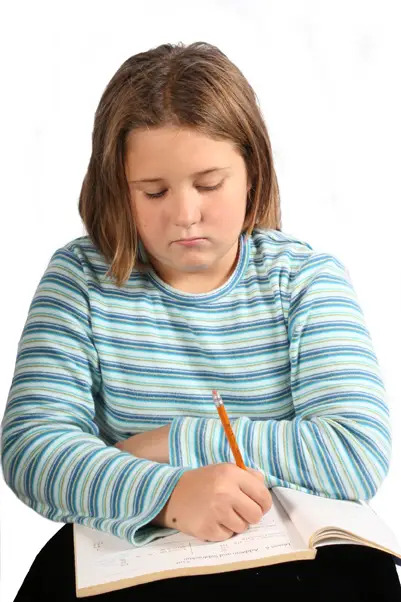 girl writing in notebook