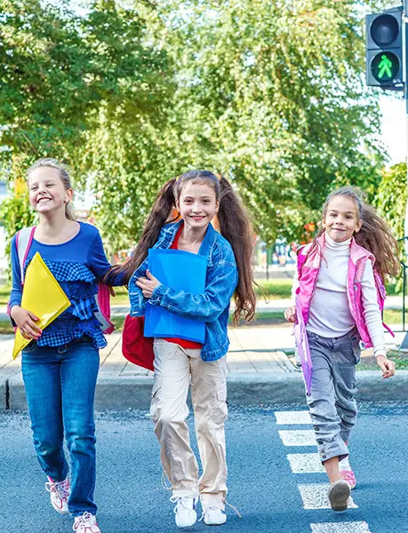 girls walking to school