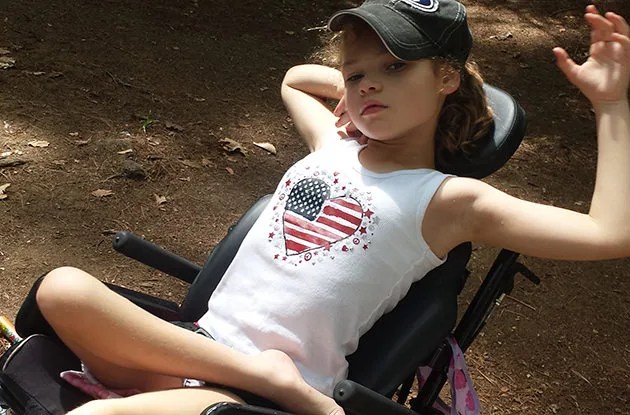 young girl in wheelchair