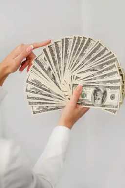 hands-holding-money