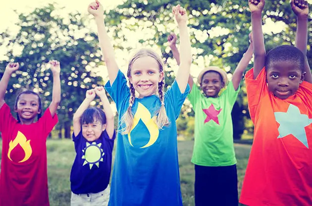 happy kids raising hands