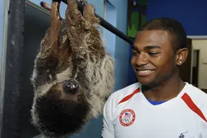 John Orozco olympic gymnast with sloth