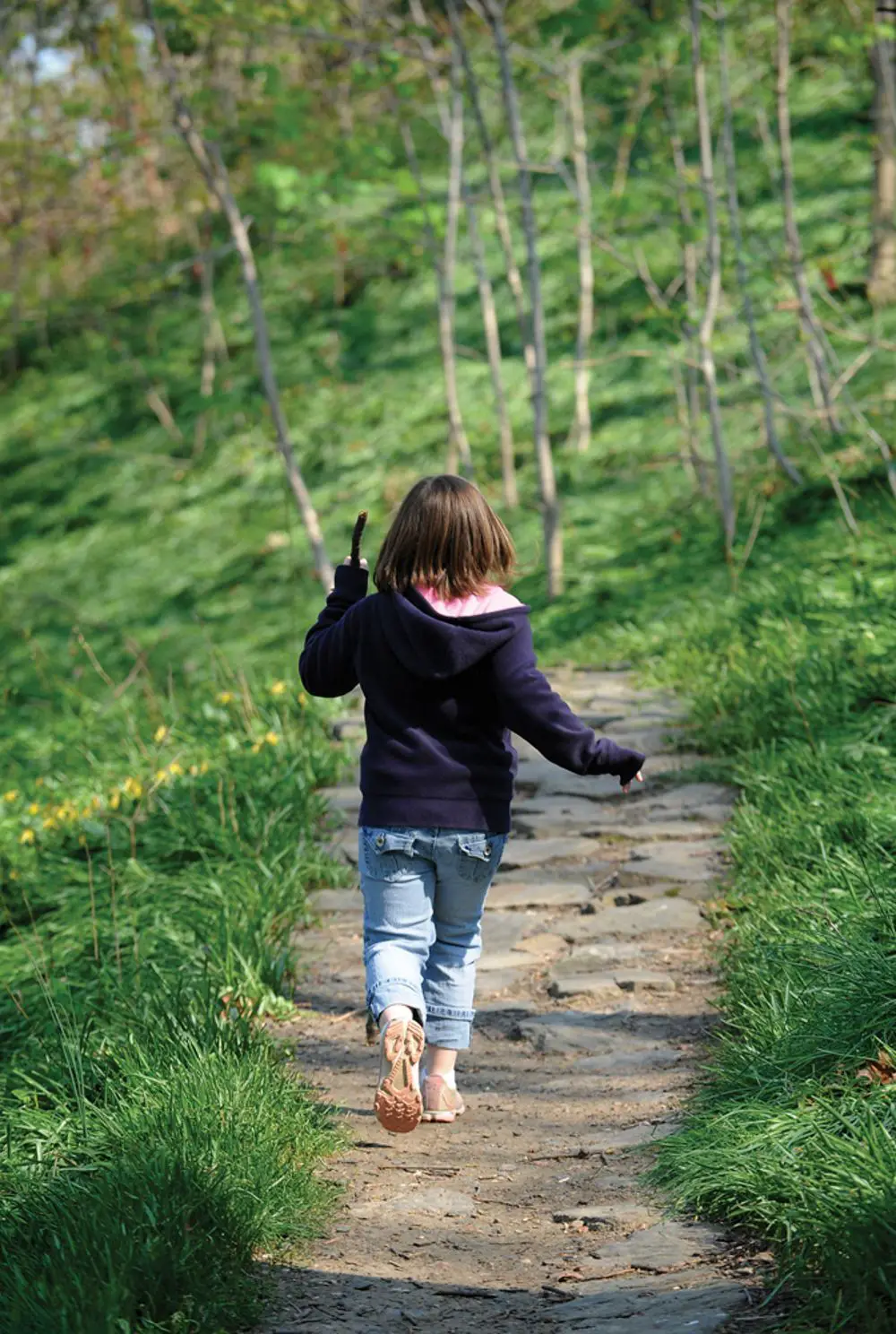 kid on nature trail
