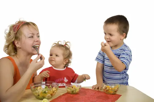 kids eating fruit salad