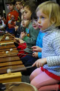 children in music class; kids play xylophone; third street music school