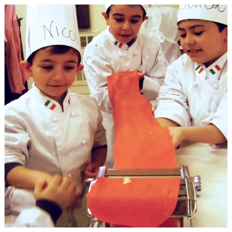 kids making pasta in cooking class