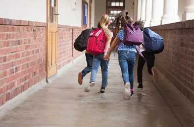 kids-running-in-school-hallway