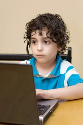 little boy with laptop 