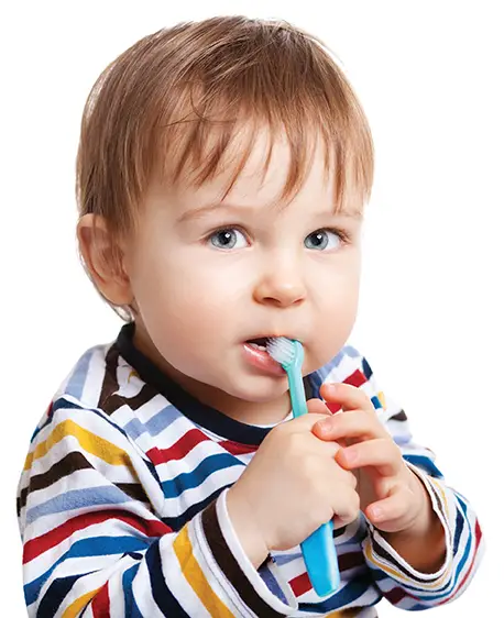 little boy brushing teeth