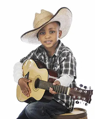 young cowboy with guitar