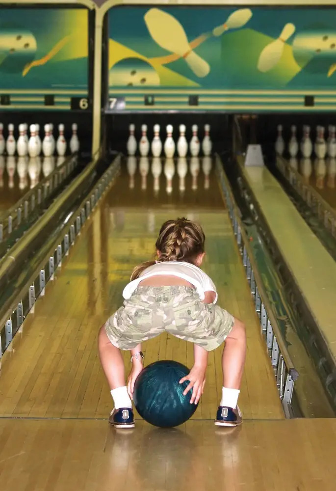 child bowling