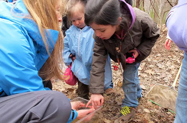 little girl interacting with nature