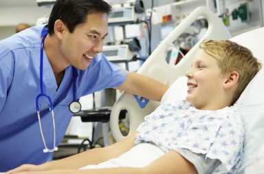 male-nurse-and-child-in-er