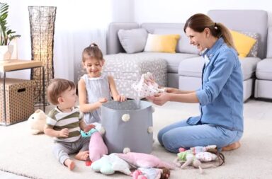 mom-and-children-picking-up-toys