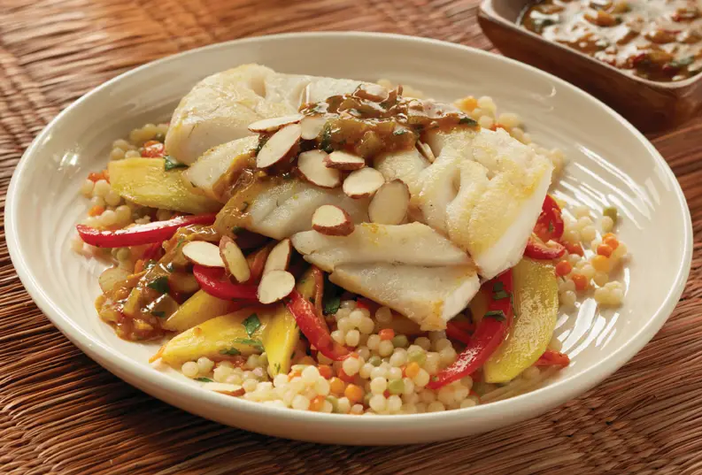 Moroccan-style cod with mango carrot slaw