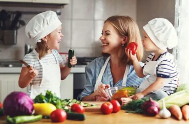 mother-and-daughters-making-salad