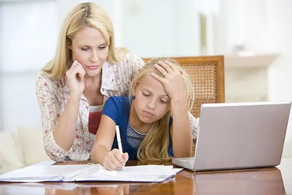 mother and daughter doing homework