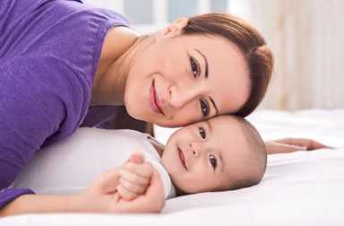 mother-cuddling-baby