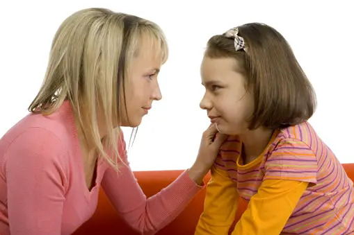 mother talking to daughter