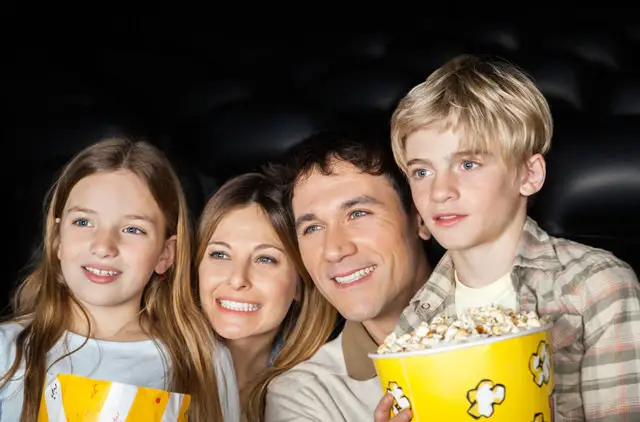 family at movie theater
