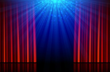 Stage with red opening curtains and spotlights