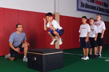 athletes practice vertical jumping